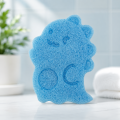 Gąbka Konjac do twarzy Dinozaur z borówką 8 × 11 cm – Bebevisa